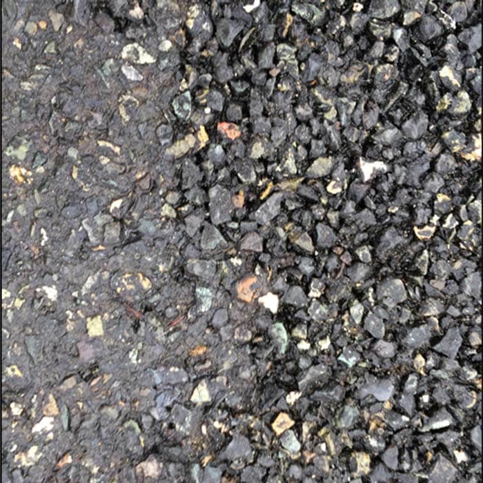 Close-up of pervious pavement surface before and after maintenance cleaning